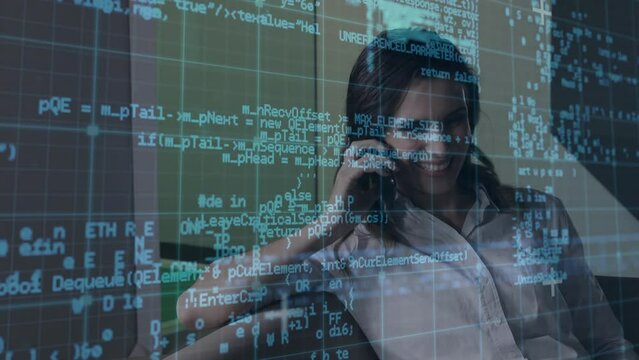 Animation of data processing over caucasian businesswoman talking on smartphone