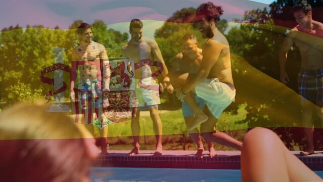 Animation of flag of spain over happy caucasian friends having fun at swimming pool