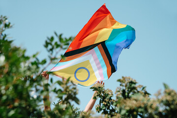 shows an intersex-inclusive progress pride flag - obrazy, fototapety, plakaty