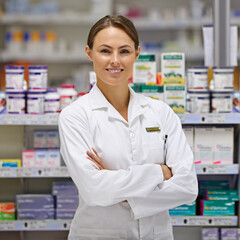 Ill do everything I can to help my customers. Portrait of an attractive young pharmacist standing...