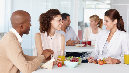 Colleagues and friends. Cropped shot of business colleagues in the office.