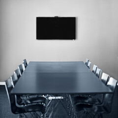 Meeting adjourned. Shot of an empty boardroom.