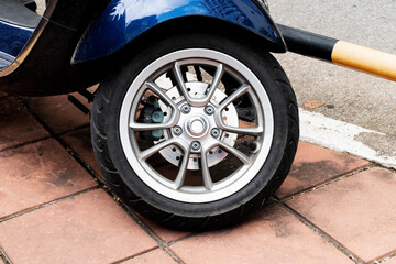 Silver color front wheel motorcycle scooter