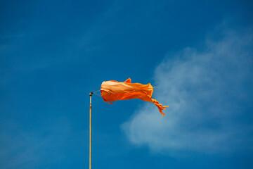 Windsock indicator of wind on tank chemical cone indicating wind direction and force. Horizontally...