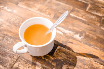 Ginger lemonade with bamboo bags, on the top of wooden wood when summer time. That image perfect for food pamphlet, product poster, product promotion and ads.