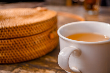 Ginger lemonade with bamboo bags, on the top of wooden wood when summer time. That image perfect for food pamphlet, product poster, product promotion and ads.