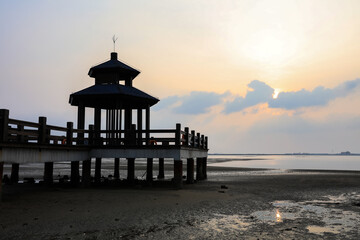 Wooden pavilions by the sea at sunrise in the morning, Sunrise by the sea