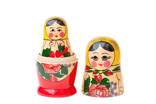 Wooden doll Matryoshka, a souvenir on a white background