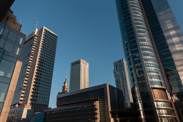 Fototapeta na wymiar Poland, Warsaw. Downtown and sky city with modern glass business buildings