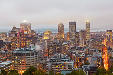 Aerial view of the skyline of Montreal, Canada illuminated at dusk