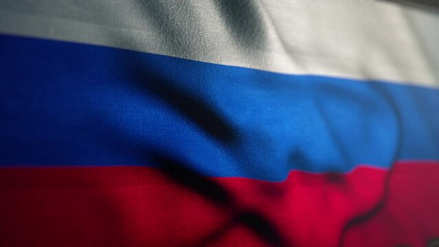 Waving colorful flag of russia federation. Russian flag is blowing in the wind