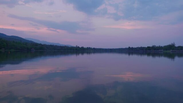 4K Cinematic landscape footage of the Huai Tueng Thao Lake in Chiang Mai, North Thailand during a beautiful sunset.