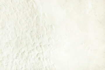 White plasticine texture with finger prints. Modeling clay material pattern background.