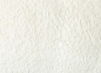 White plasticine texture with finger prints. Modeling clay material pattern background.