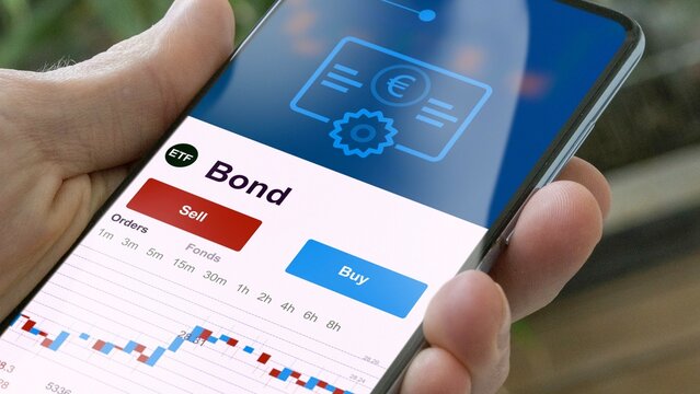 Exchange-traded fund chart, invest in etf bonds market data on smartphone of bonds. Business analysis of a trend. Investing in international bond. Buying bond strategic ETF