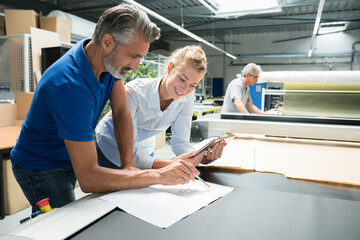 Obraz premium paper packaging designers at work