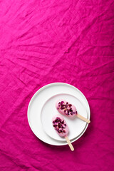 Obraz na płótnie Canvas Ice cream bar with pink topping