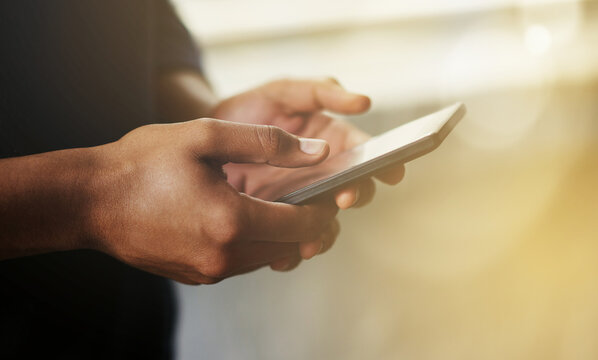 Textingthe Faster Way Of Reaching The People That Matter. Cropped Shot Of A Man Using A Smartphone.