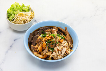 Stewed Chicken Noodle in Brown Soup Bowl - thai food style