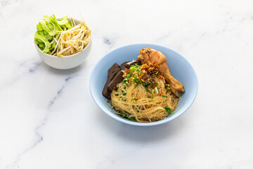 boiled dry egg yellow noodles topping braised chicken leg