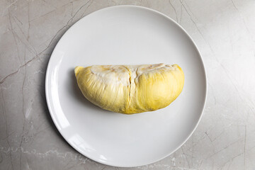 Durian riped and fresh on white plate