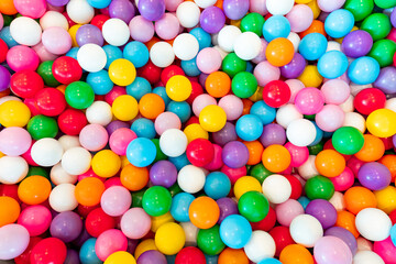various colored plastic balls background