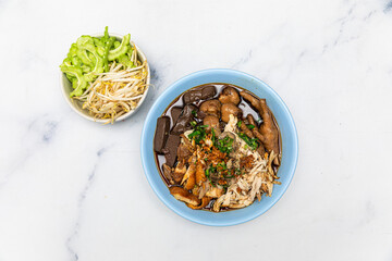 Stewed Chicken Noodle in Brown Soup Bowl - thai food style