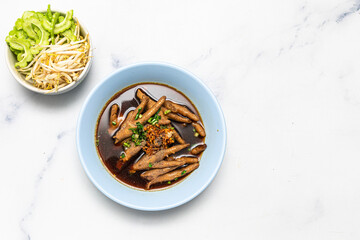 chicken feet soup . Chinese chicken feet soup on background.