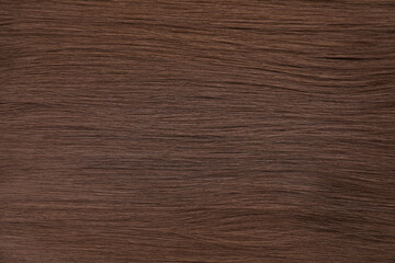 Naklejka premium Beautiful brown hair as background, top view