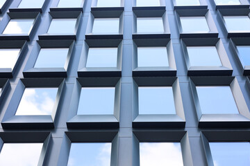 Modern building with tined windows, low angle view