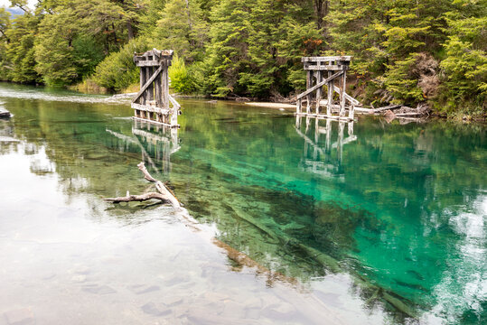 View of the remains of the old wooden bridge that crossed the Ruca Mal&eacute;n River on the section of Route 40 that makes up the Camino de los Siete Lagos, in the province of Neuqu&eacute;n, Argentina.