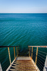Una scala per scendere al mare a Barcola, frazione di Trieste, dove passa la seconda tappa della...