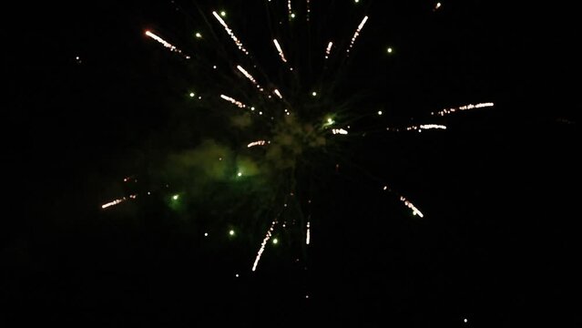 festive luxury fireworks. New year eve fireworks celebration loop seamless real fireworks background. abstract Multicolor golden shining glowing show lights night sky. fireworks ban interdict petition