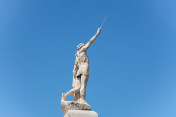 Victor Emmanuel II of Italy statue, king of Sardinia and united Italy, blue clear sky background. Monopoli, Italy, Apulia 