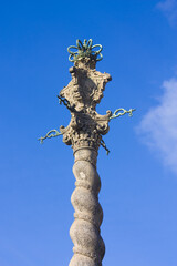 Carved shameful stone pillory for punishment on the square near the Porto Cathedral (Cathedral Se) in Porto, Portugal