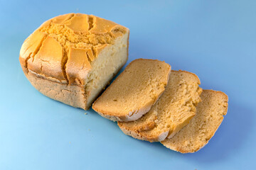 Corn bread. Homemade cornmeal bread on a blue background .Top view