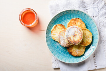 Cottage cheese pancakes with honey.