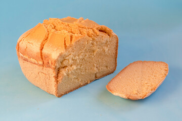 Corn bread. Homemade cornmeal bread on a blue background .Top view