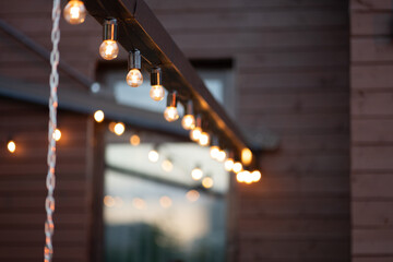 Yellow bulbs on wooden background.