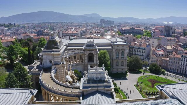 Aerial drone panoramic view of Longchamp palace park complex picturesque sights of classic architecture historical construction with water cascade fountain touristic place iconic landmark in Marseille