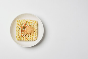 Instant noodles composition. Noodles on white background