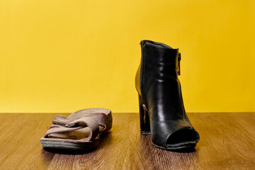 Concept of rich and poor in a , old and new foot wear