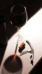 glass of wine on black