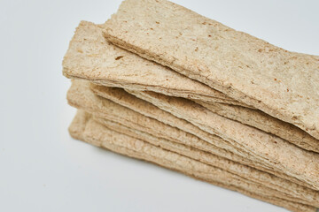Rye crispbread on white background. Healthy food