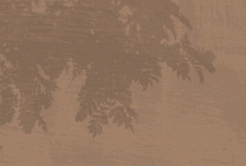 Natural light casts shadows from a leaves branches of tree. Top view of the shadow of tree leaves on a textured brown colored background. He was lying flat