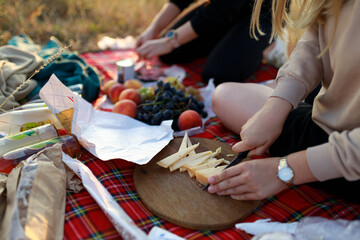 girl cutting cheese