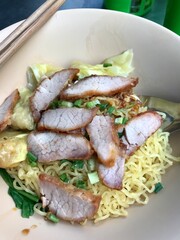 Egg noodle with grilled pork and vegetables 