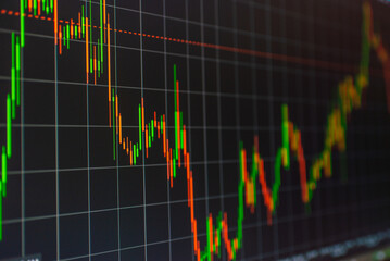 Stock market data.Online trading,investing platform on the computer screen.Selective focus.