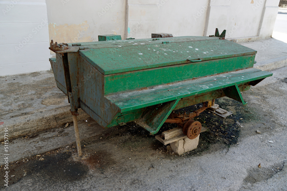 Wall mural rotten trailer without wheels in havana