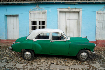 old classic cars in the streets of trinidad